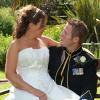 Image of a bride and groom on a bench